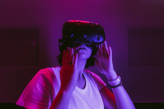 Young woman with virtual reality glasses