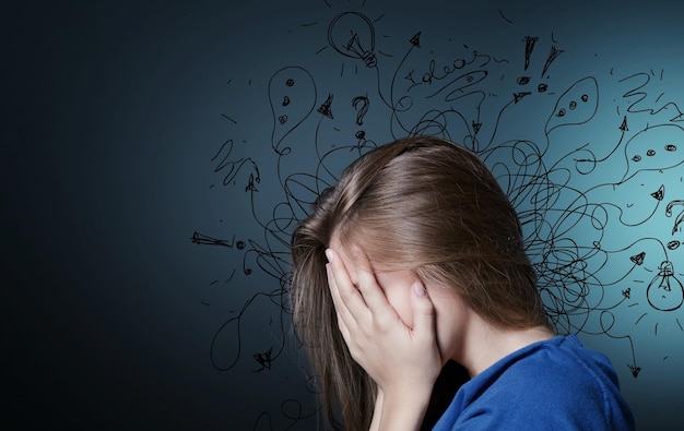 Young woman with worried stressed face expression with illustration