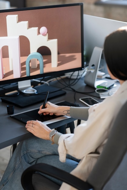 Young woman working in an animation studio