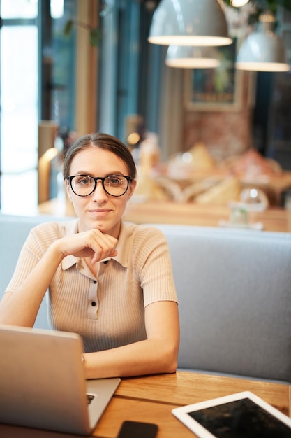 Young woman working in cafe