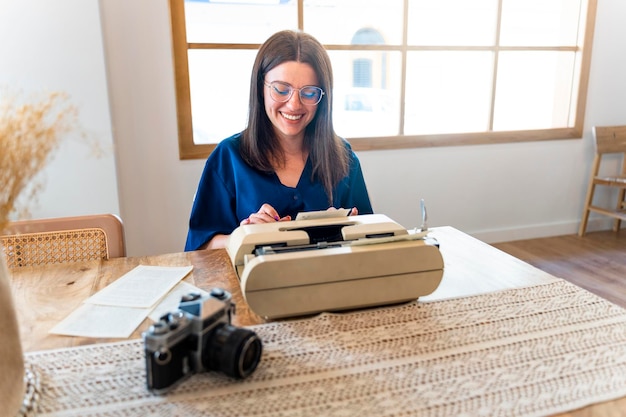 Young Woman Working Focused On Typewriter