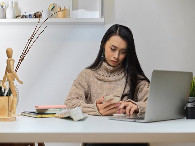 Young woman working on her project