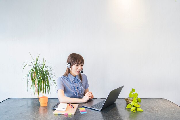 Young woman working at home