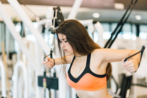 Young woman working out in a gym