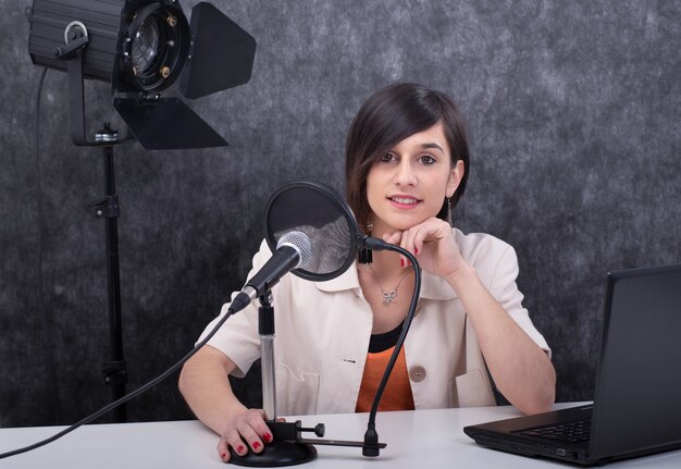 Young woman working on the radio