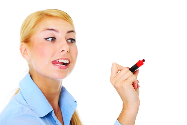 a young woman writing on a board with a red marker