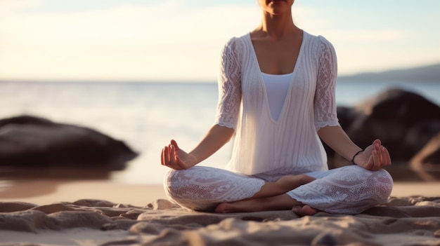 young women doing yoga on the beach