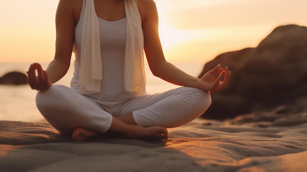 young women doing yoga on the beach