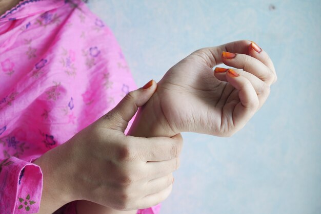 young women hands suffering wrist pain