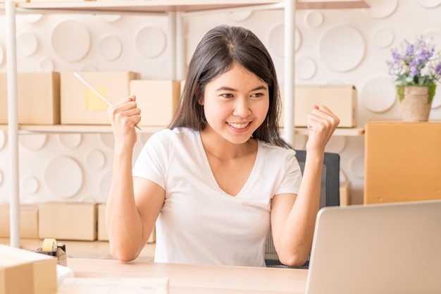 Young Women happy after new order from customer