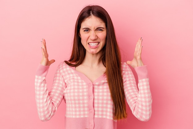 Young women isolated screaming with rage.