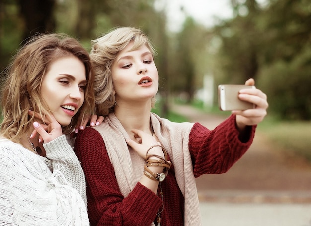 Young women making selfie