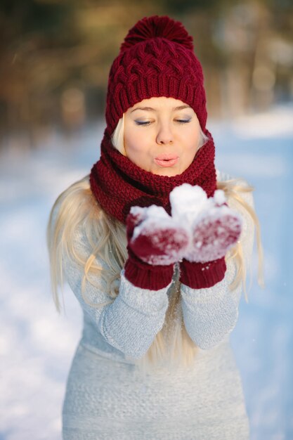 Young women playing snowballs