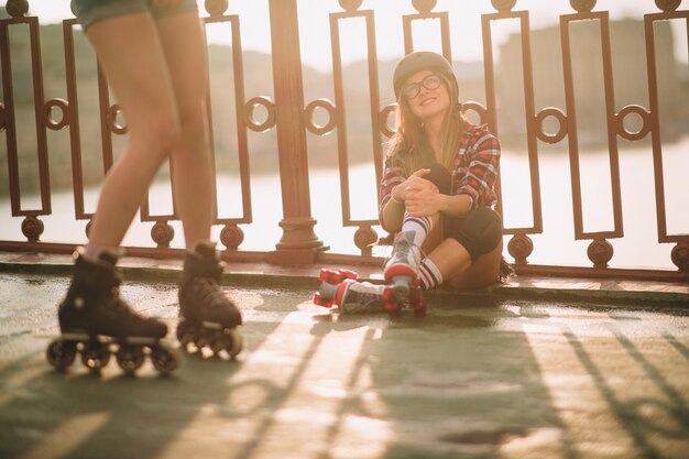 young women and roller skates