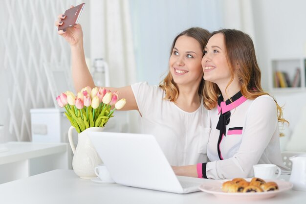 Young women taking selfie