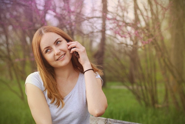 Young women talking on a mobile phone. 