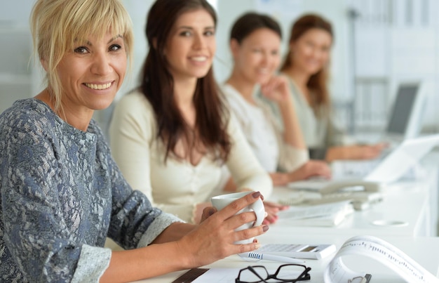 Young women working at office