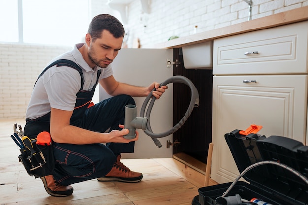 young worker sit in kitchen