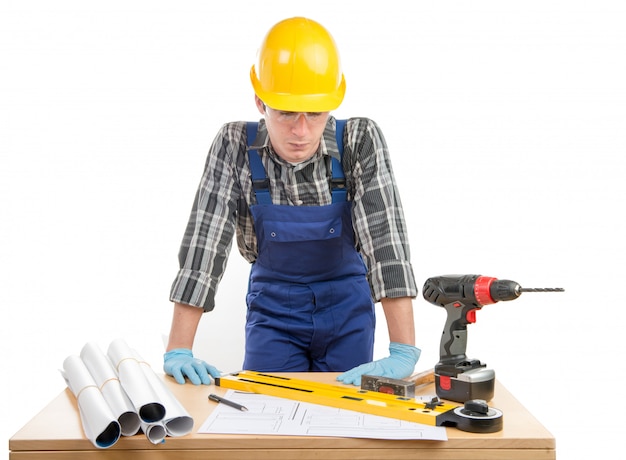 Young worker works at his desk