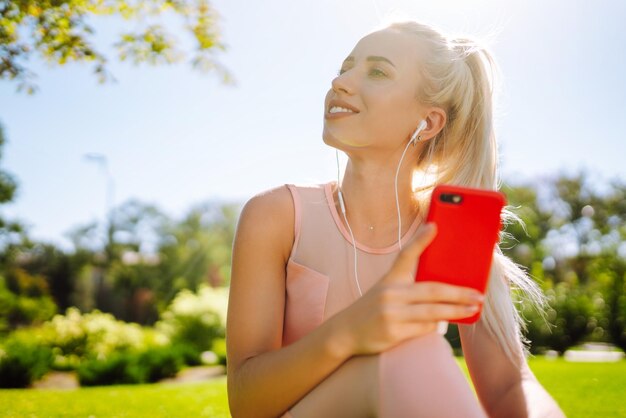 Young yoga woman enjoy listening to music with headphone with feeling happy and relaxed