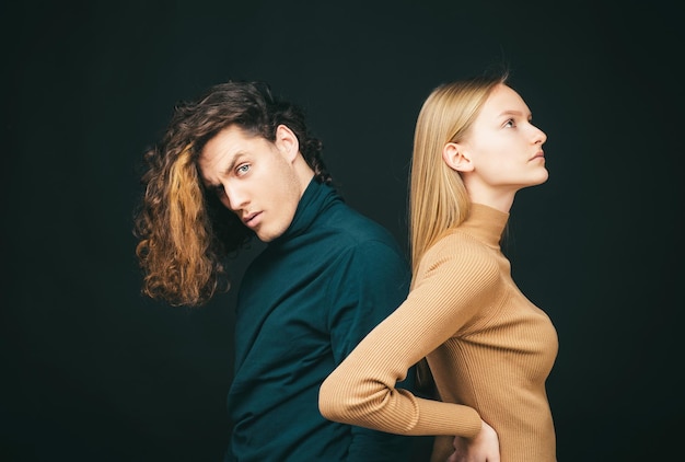 Youth love and lifestyle concept couple of man with curly hair and blonde woman in hairdresser salon