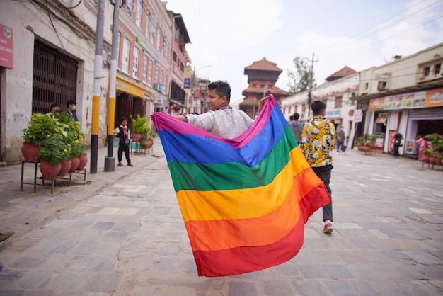 Youth participates in an LGBTQ parade on the occasion of pride month
