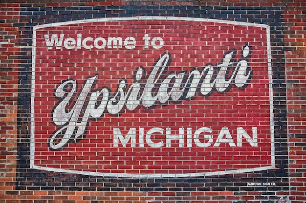 Ypsilanti welkomstmuur op bakstenen muur Michigan