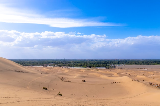 Yueyaquan Scenic Area, Mingsha Mountain, Dunhuang City, Gansu Province, China. Gansu Dunhuang Crescent Lake and Mingsha Mountain,China