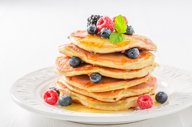 Yummy american pancakes with fresh berry fruits