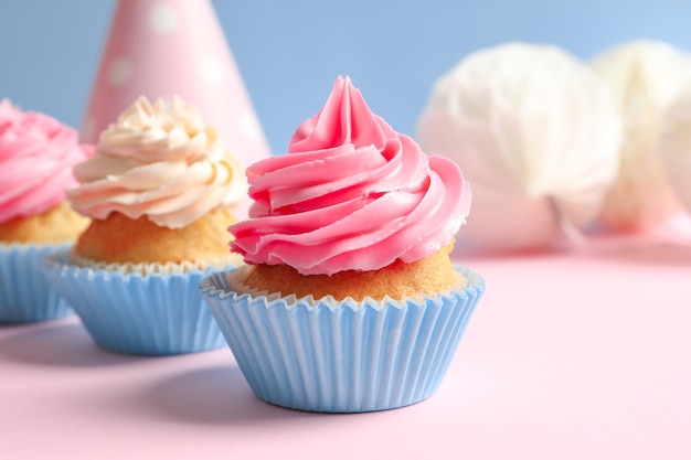 Yummy cupcakes on table