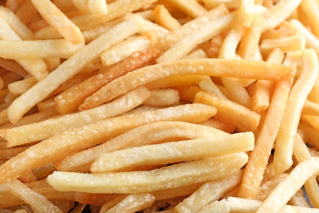 Yummy french fries as background