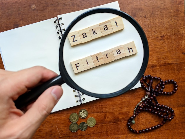 Photo zakat fitrah with concept zakat fitrah is a type of almsgiving or tax paid by muslims in ramadan