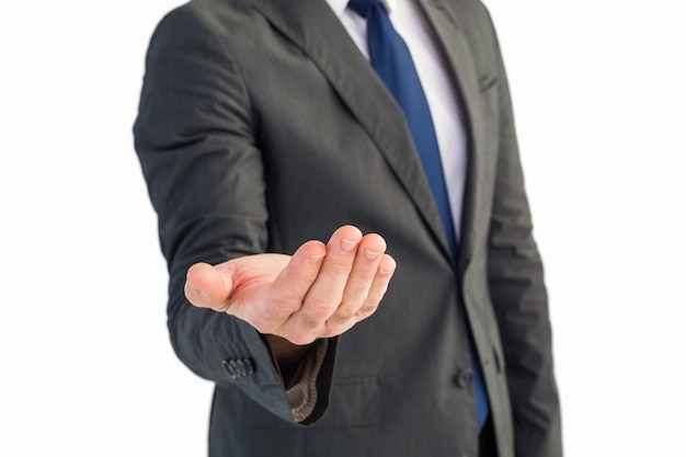 Foto zakenman die zijn hand standhoudt