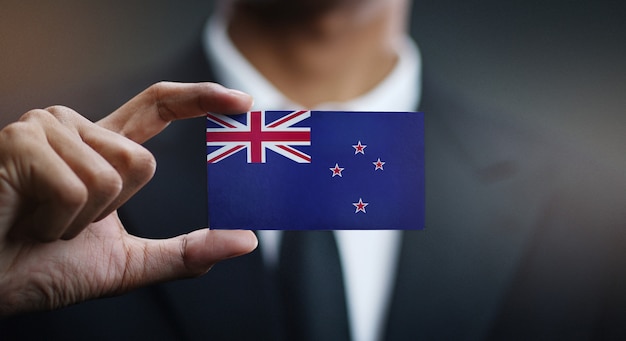 Zakenman Holding Card van de vlag van Nieuw-Zeeland