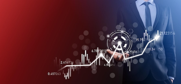 Foto zakenman in de hand houden bancaire zakelijke financiën grafiek en investeren in beursinvesteringen punteconomische groei en investeerder conceptanalyse virtuele aandelenmarkt chartanalyse door gebruik technologie