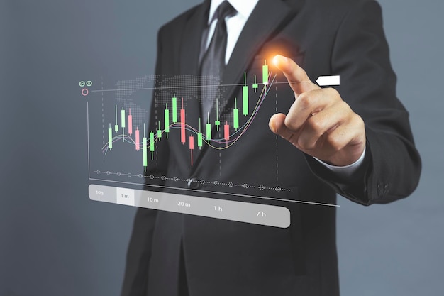 Zakenman met statistiekgrafiek van de analyse van financiële indices van de aandelenmarkt