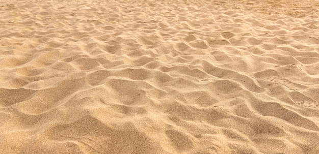 Zand op het strand als achtergrond