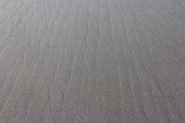 Zand op het strand als achtergrond