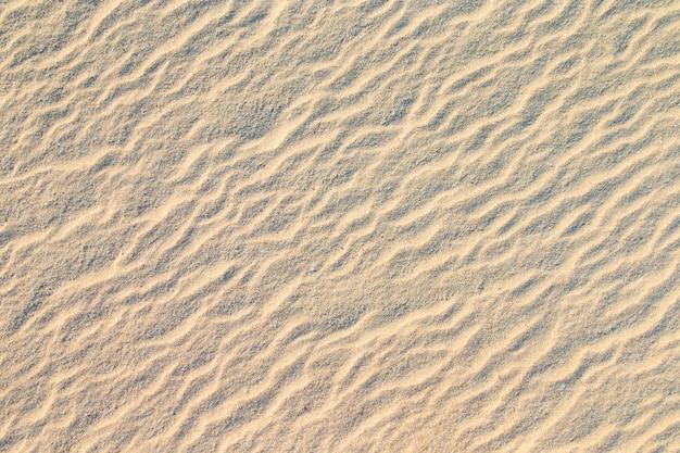 Zandpatroon van een strand in de zomer