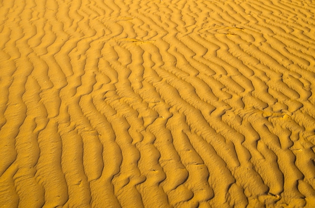 Zandtextuur in Gouden woestijn