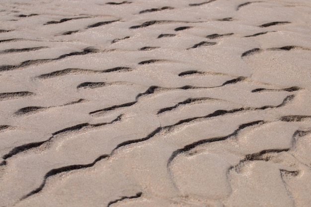 Zandtextuur op het strand