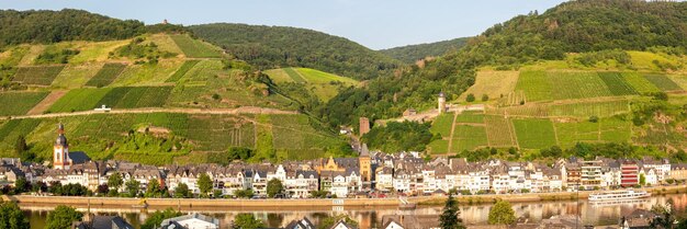 Zell an der mosel town at moselle river with vineyards wine panorama in germany