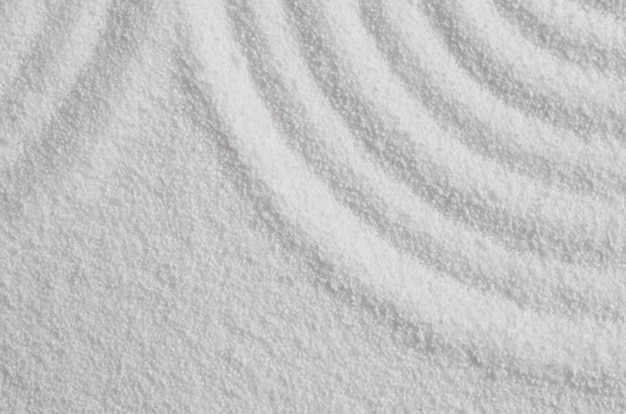 Zen garden with line pattern in white sand in Japanese style Sand texture with the wave parallel lines patternHarmonyMeditationZen like concept
