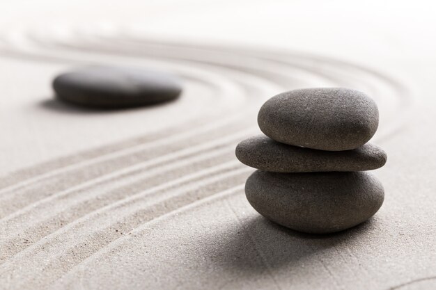 Zen stone garden round stone and raked sand 