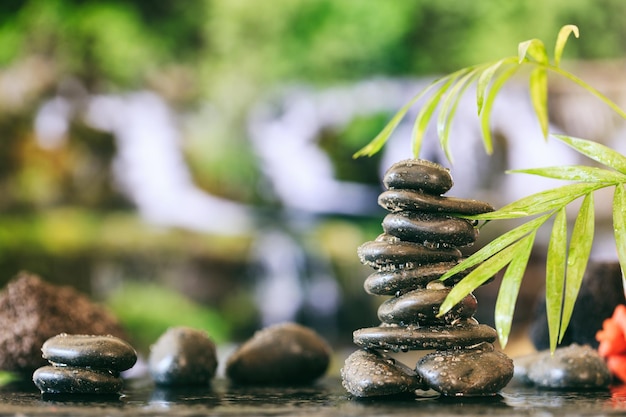 Photo zen stones stack on abstract background