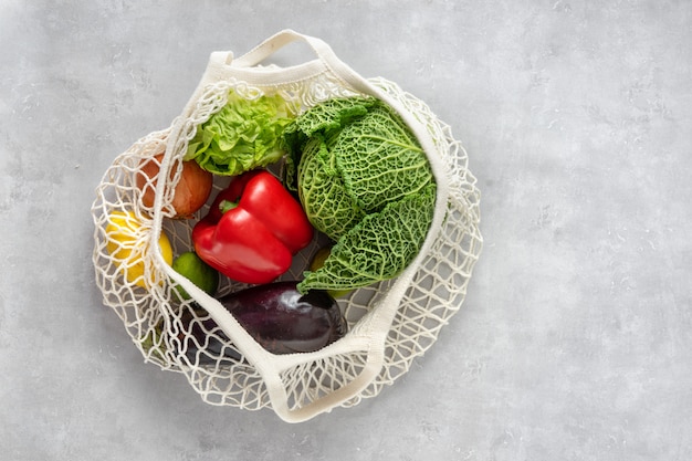 Zero waste concept. Vegetables in a net bag