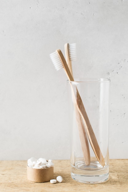 Zero waste concept. Wooden ecological bathroom accessories on white background