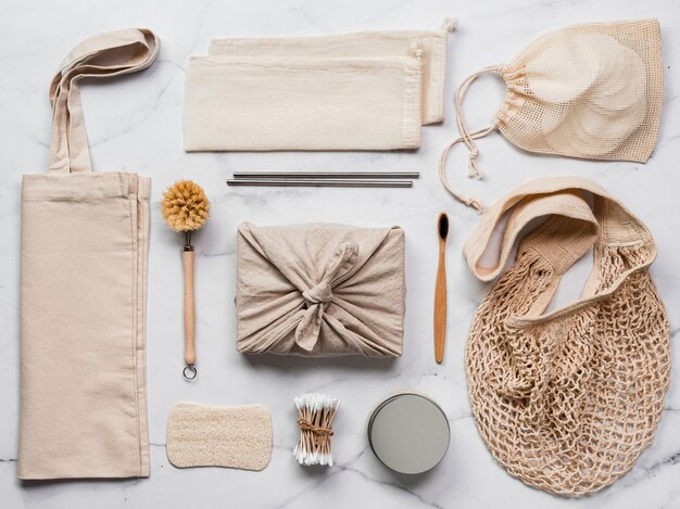 Zero waste gifts concept. Textile wrapping gift, eco bags and co-friendly kitchen tools