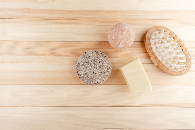 Zero waste health care.  Reusable bottles, bamboo toothbrush and sponges. Top horizontal view copyspace.