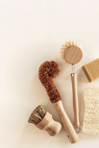 Zero waste kitchen cleaning concept eco friendly natural cleaning tools and products bamboo dish brushes no plastic ecofriendly lifestyle top view flat lay